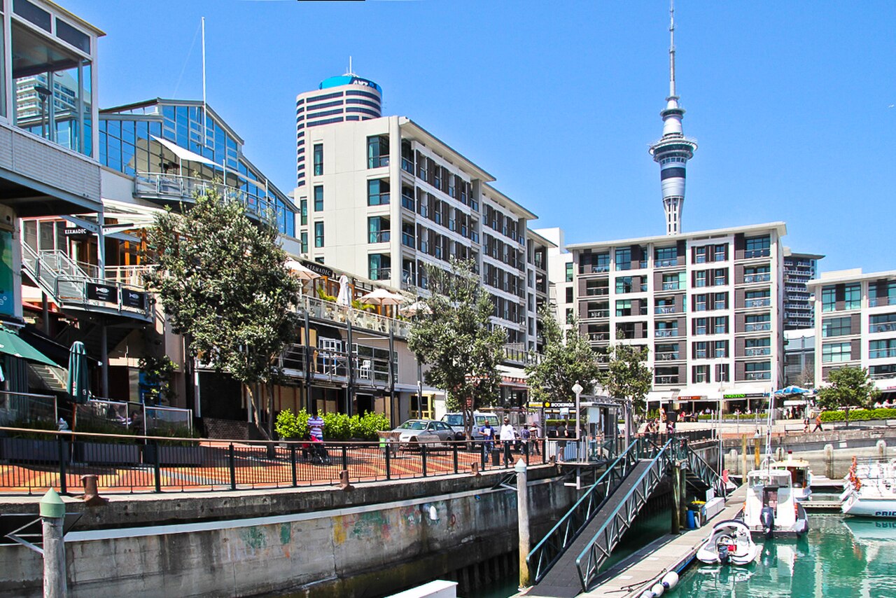 Waitematā Harbour, yachts, and the Auckland waterfront with the Sky Tower
